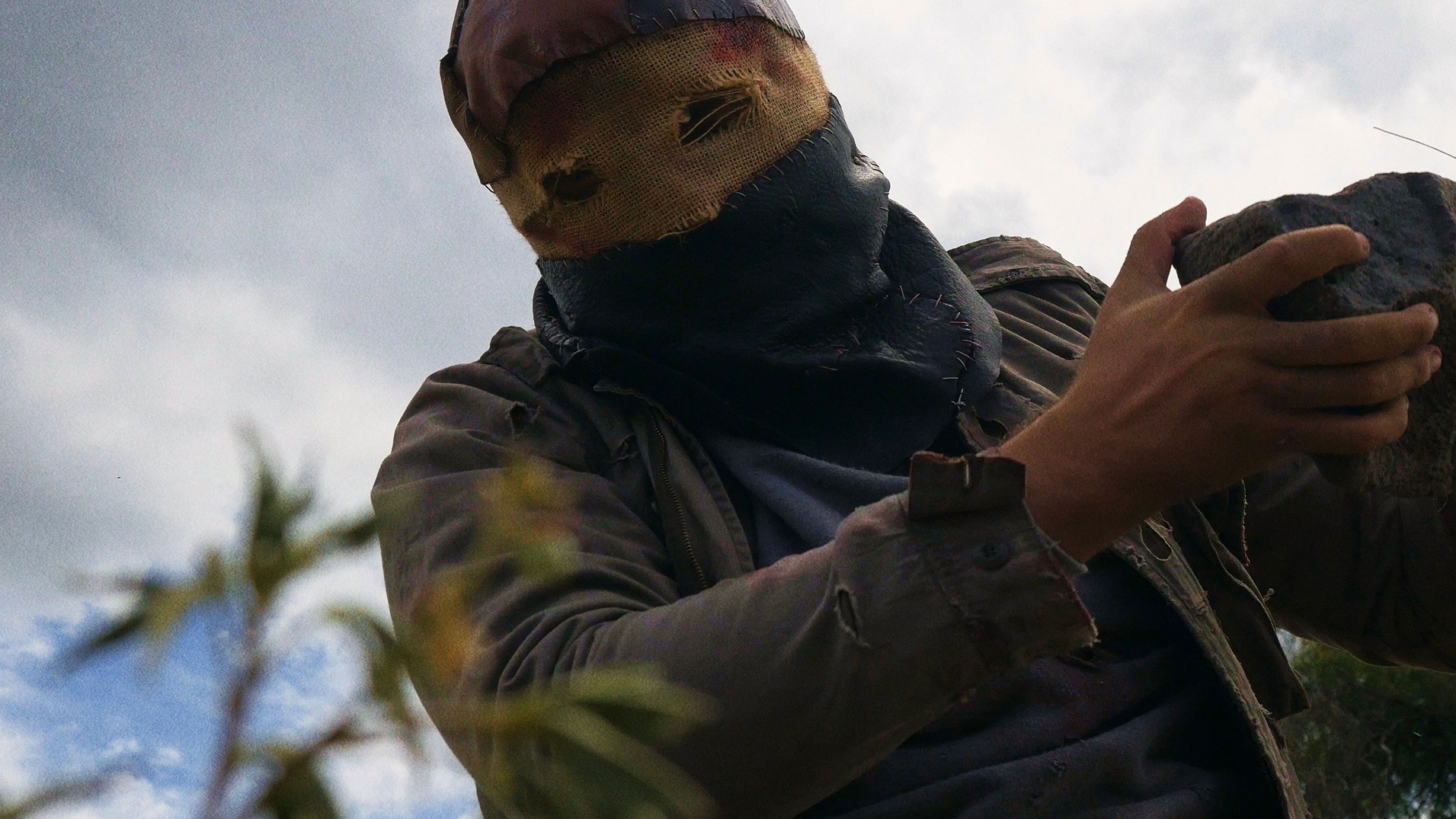 El Asesino: Silencio y Muerte Background