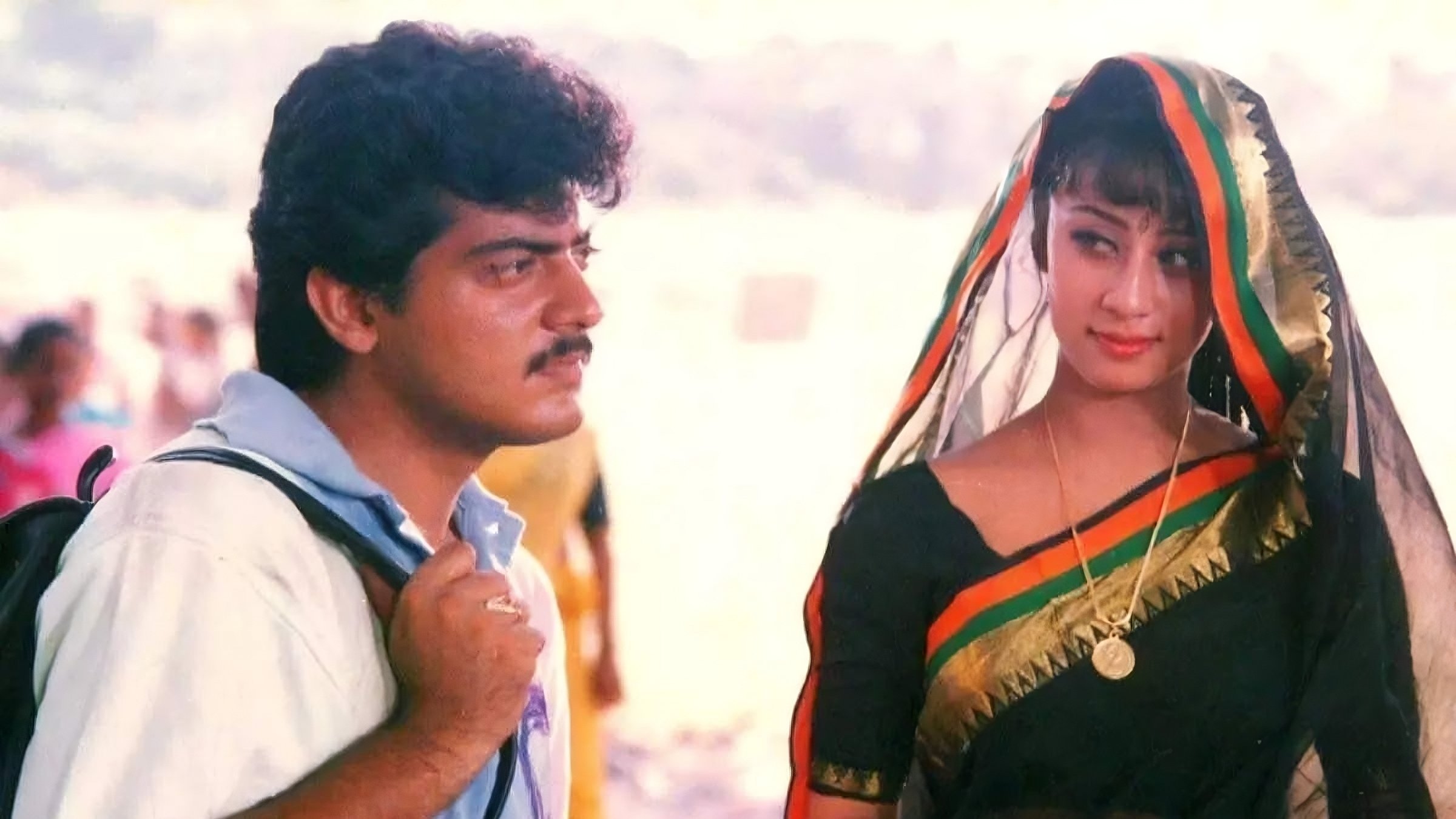Kadhal Mannan Background