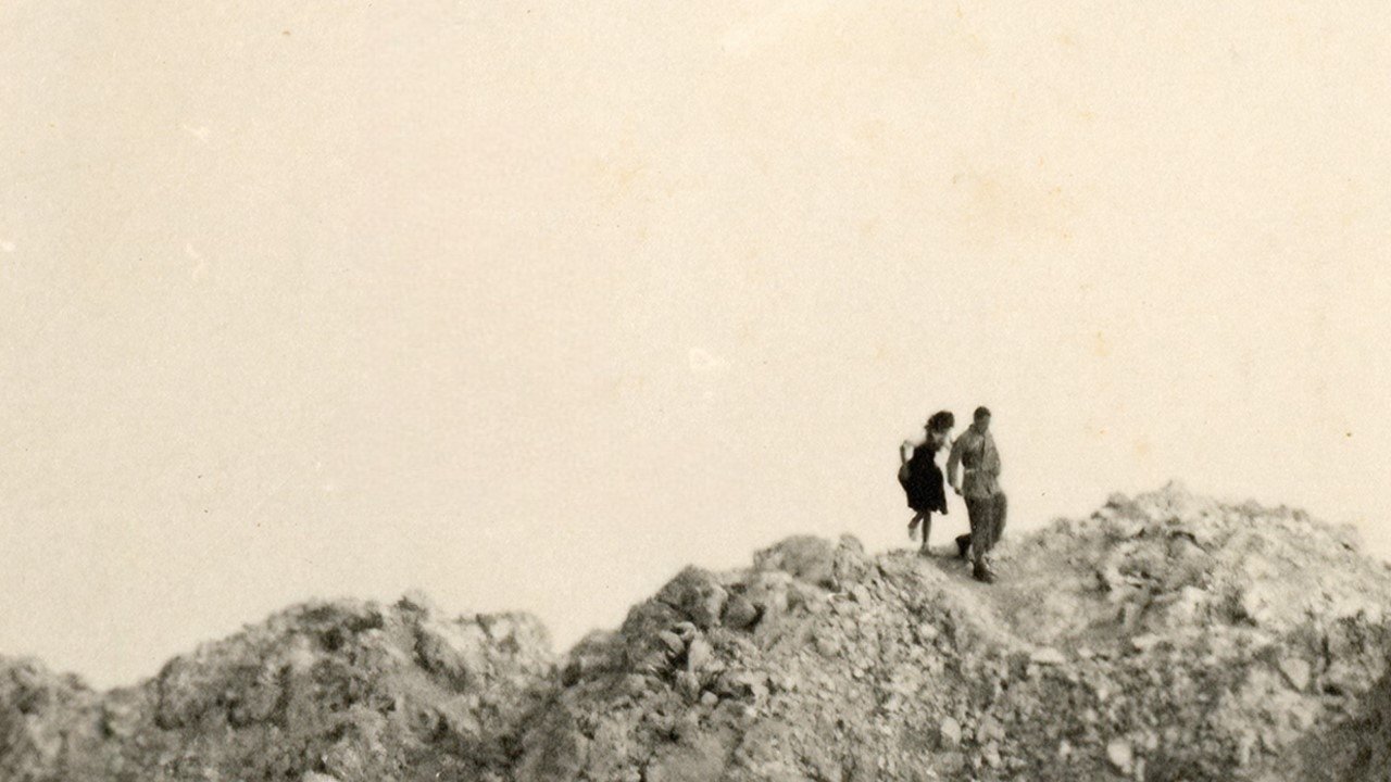Un milione di granelli di sabbia Background