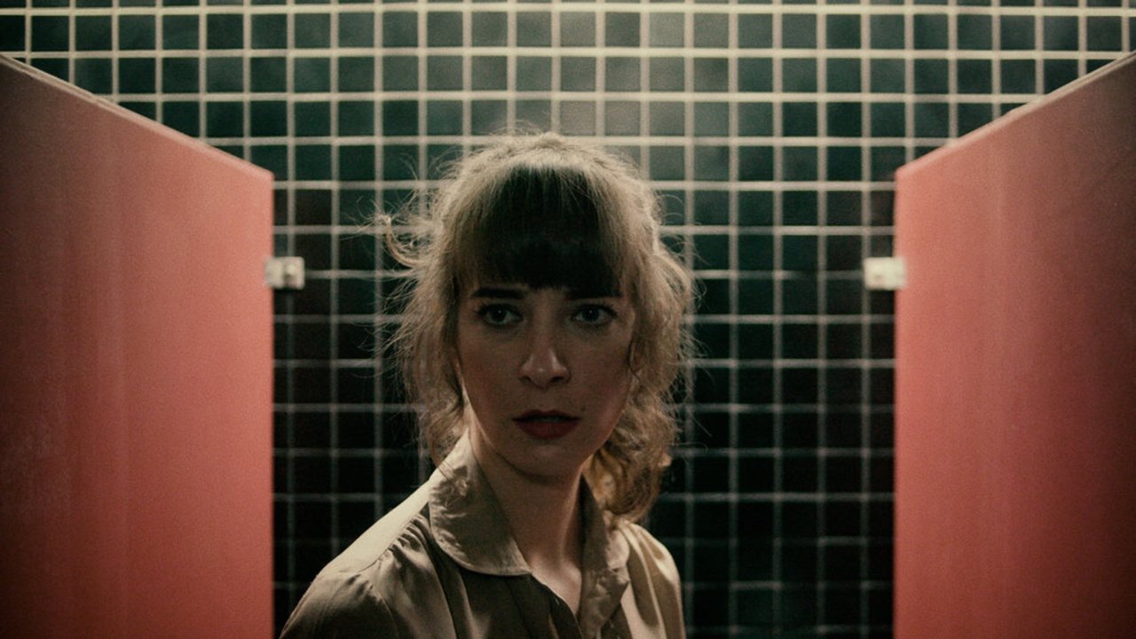 Woman in Stall Background
