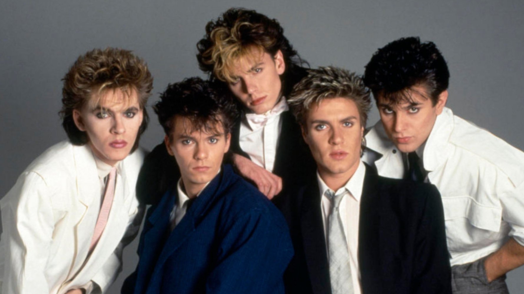 Duran Duran: Sing Blue Silver Background